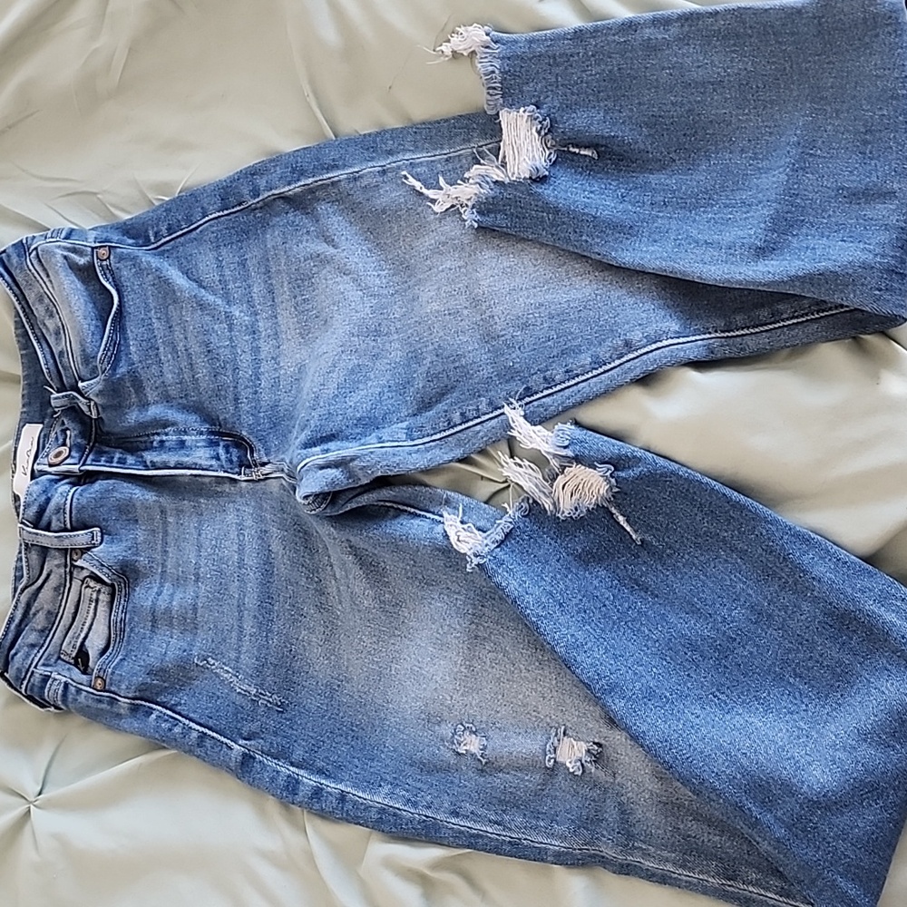 Distressed Blue Jeans